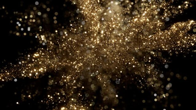 Cg animation of golden glitter explosion on black background. Slow motion with shallow depth of field. Has alpha matte
