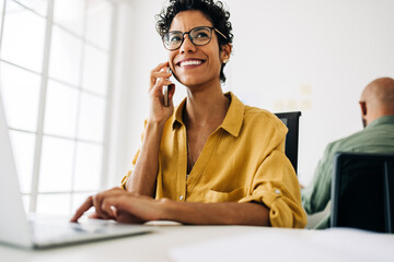 Accountant making phone calls in an accounting firm