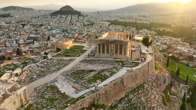Sunrise at the Acropolis in Athens, Greek landmark aerial view, iconic antique ancient monument in Greece, capital of Greece skyline in golden light