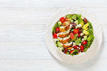 Mediterranean grilled Chicken Salad in white bowl
