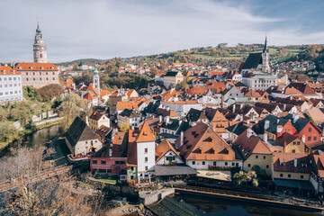 Fototapeta premium Cesky Krumlov, Czech - Nov 21, 2022 : Autumn view of Cesky Krumlov, Czech Republic, with river flowing through buildings