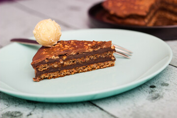 Pieces of chocolate cake decorated with pralines