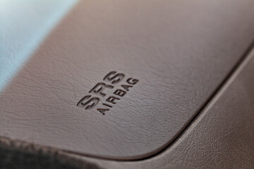 SRS AIRBAG on car dashboard near passenger seat with copy space