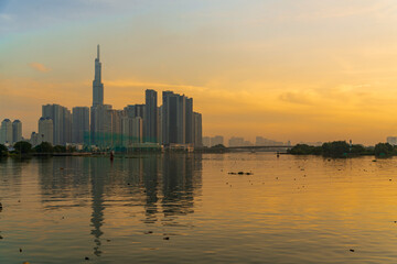 Fototapeta premium Beautiful morning in District 1, view to Landmark 81, the tall skyscraper in Vietnam and all Southeast Asia.