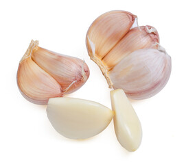 Top view fresh peeled garlic cloves, bulb with garlic slices on white background.