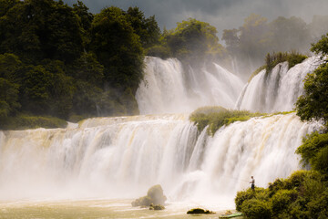 Ban Gioc, or Detian waterfall, situated at the border between Vietnam and China, ranks as the largest transnational waterfall in Asia and 4th in the world