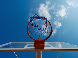 basketball hoop and blue sky © enginakyurt