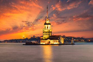 Awesome sunset at Maiden Tower. An iconic landmark on Istanbul's skyline, the Maiden's Tower has a rich history dating back to the fourth century, as well as a few legends.