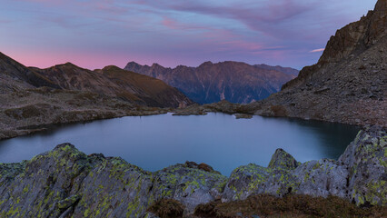 Alpine lake reflections after sunset, blue hour