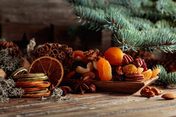 Christmas still-life with dried fruits and nuts.
