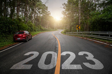 Empty asphalt road with New year 2023 concept. Direction to new year concept and sustainable development idea for goal and success.