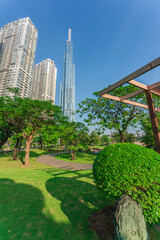 Landmark 81, skyscrapers viewed from below towards sky represents urban development with modern architecture. Combined with Vinhomes Central Park Project