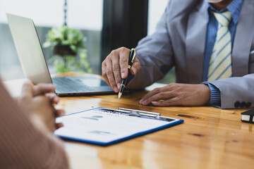 Job search and job interview, female candidate is a new employee of the company being interviewed about her resume and work experience.