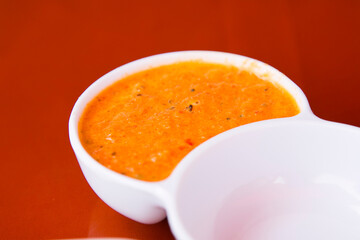 Ají ingredient. Preparing a delicious Peruvian sea bass ceviche in the fishing port of Chorríos in Lima.