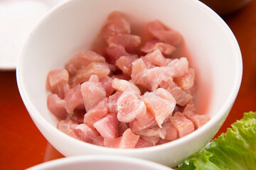 Preparing a delicious Peruvian sea bass ceviche in the fishing port of Chorríos in Lima.