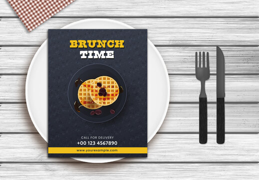 Food menu card template with top view of  serving platter, knife, fork and cloth napkin on wooden texture background
