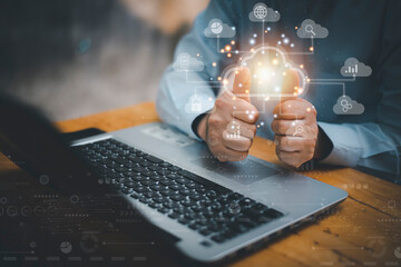 Big data analytics and business intelligence concept with chart and graph icons on a digital screen interface and a businessman in background