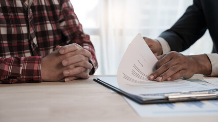 Loan approver, businessman in suit, man giving car keys after car loan approval and contract signing