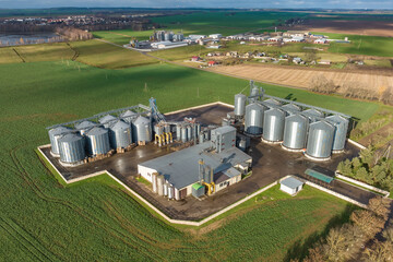aerial view of a huge agro-industrial complex with silos and grain drying line