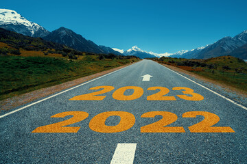 2023 New Year road trip travel and future vision concept . Nature landscape with highway road...