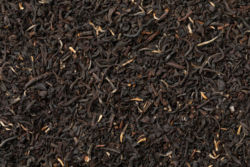 Golden Garden Estate Ceylon dried Tea leaves close up full frame as background