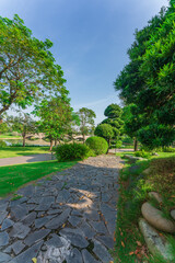 City park with modern building background in Ho Chi Minh city, Vietnam
