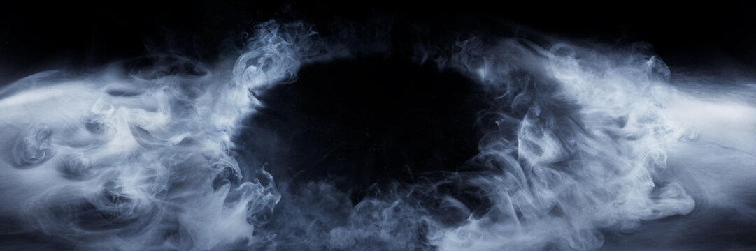 Panoramic view of the abstract fog. Red cloudiness, mist or smog moves on black background. Mockup for your logo.