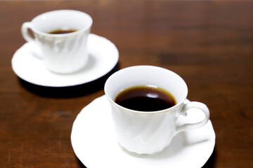 Fototapeta na wymiar 白い器のホットコーヒー