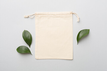 Small eco sack on color background. Top view.