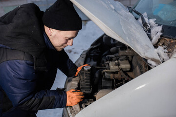 truck van car driver fixing the car in winter on the road. Delivery car breakdown in winter