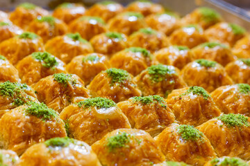 Turkish baklava cakes with pistachio on top. Traditional bakery puff pastry pies from Turkey