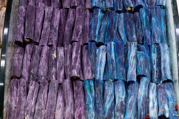 Purple and blue Turkish delight sweets. Candy sticks stuffed at grand bazaar window display