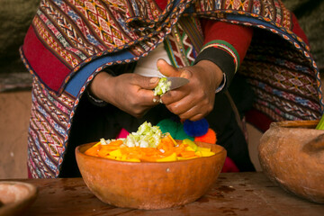 Cooking a traditional Andean vegetable soup before a Pachamanca feast with a Quechua tribe in the...