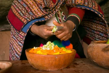 Foto op Canvas Cooking a traditional Andean vegetable soup before a Pachamanca feast with a Quechua tribe in the Sacred Valley, Peru. © Leckerstudio