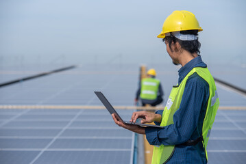 Engineer checking equipment in solar power plant