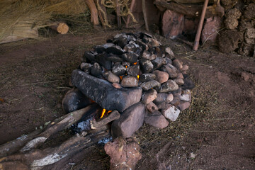 To prepare the Pachamanca ceremony, first you have to prepare an oven with stones that are going to heat up for 4 hours.
