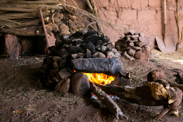 To prepare the Pachamanca ceremony, first you have to prepare an oven with stones that are going to heat up for 4 hours.