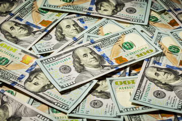 Business finance concept background of hundred dollars bank notes bills of new 2013 year edition - 553242137