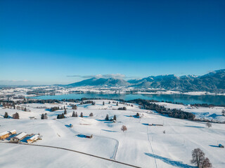 Winter landscape in the Allgäu with mountains and a lake