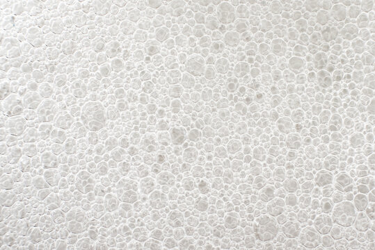Soap foam background. Small soap bubbles of white color. Shampoo texture