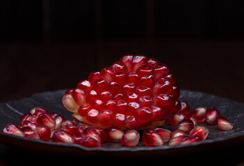 Pomegranate, ripe and juicy fruit with a set of vitamins