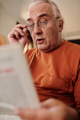 Man Reading Shocking News