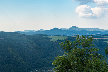 Hills of Ceske stredohori mountains from Vysoky Ostry hill near Usti nad Labem city in Czech republic - obrazy, fototapety, plakaty