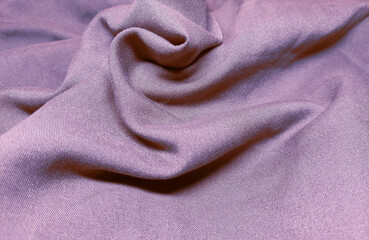 Closeup of pink wrinkled silk cloth