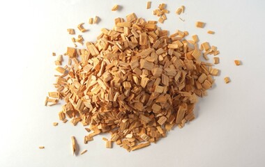 Top view a pile of wood wood texture chips isolated on white background.