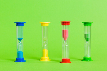 hourglass on the table, sand clock as time passing concept for business deadline, copy space