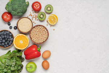 Healthy food. Vegetables, fruits, berries, beans, cereals and lettuce on white background. Concept for menu, meal plan, healthy diet