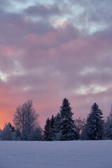 Evening clouds over the Olterudelva Valley in winter. Toten, Norway.