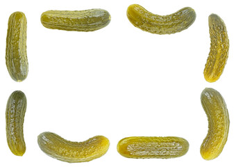 Frame from fresh pickled cucumbers isolated on a white background. Gherkins.