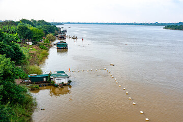Vietnam, Hanoi, the Hong  River (red river) delta with it's house boats. 